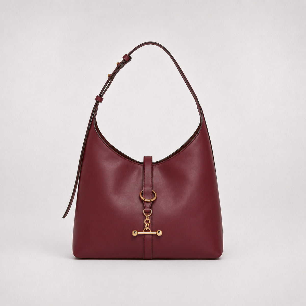 Slouchy hobo shoulder bag with gold-tone toggle ring hardware and adjustable strap, detail view 9