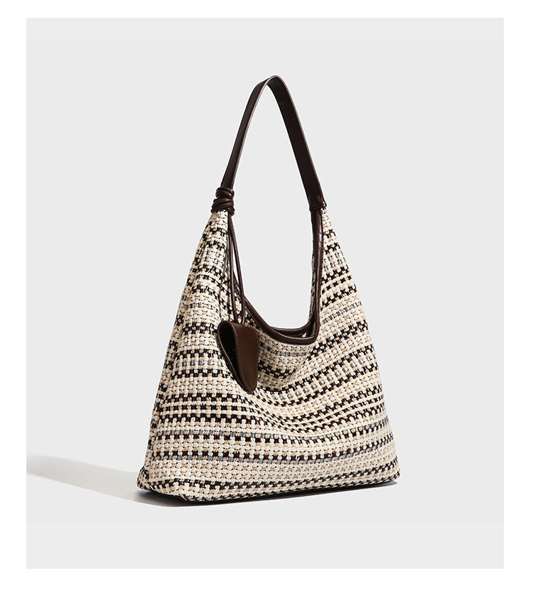 Slouchy woven stripe hobo shoulder bag with black-and-white pattern and leather-look strap, detail view 15