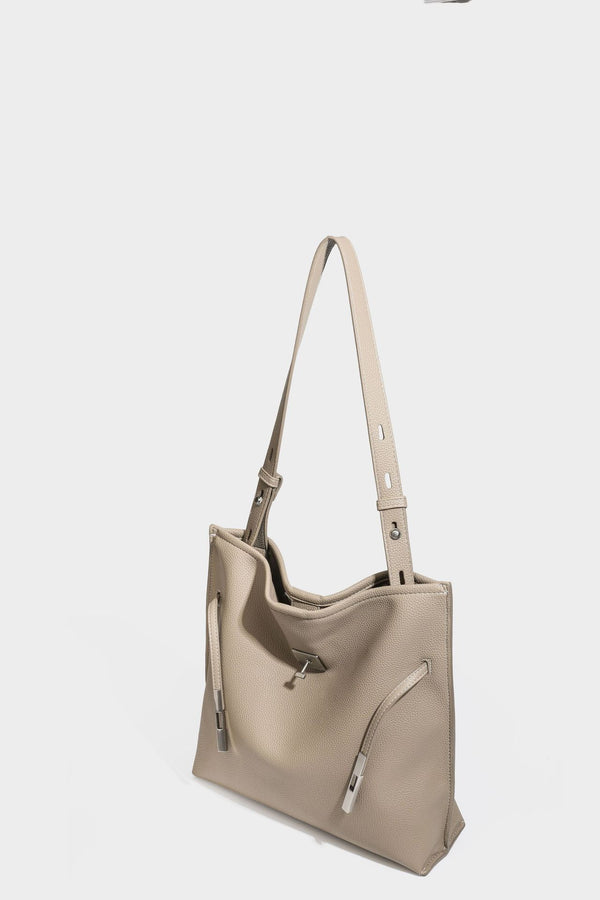 Pebbled leather-look tote bag with front toggle hardware and long shoulder strap, detail view 24
