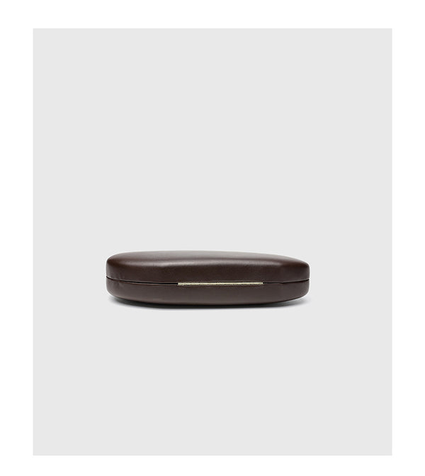 Oval hard-shell crossbody clutch bag with smooth matte leather-look finish and gold-tone snake chain strap, detail view 12