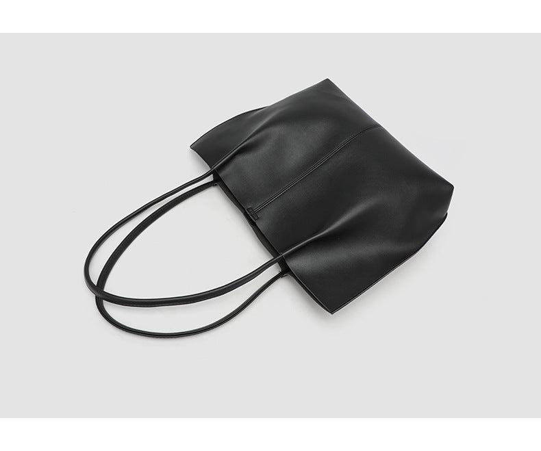 Large slouchy matte leather-look tote bag with double shoulder straps and centre seam detail, detail view 8