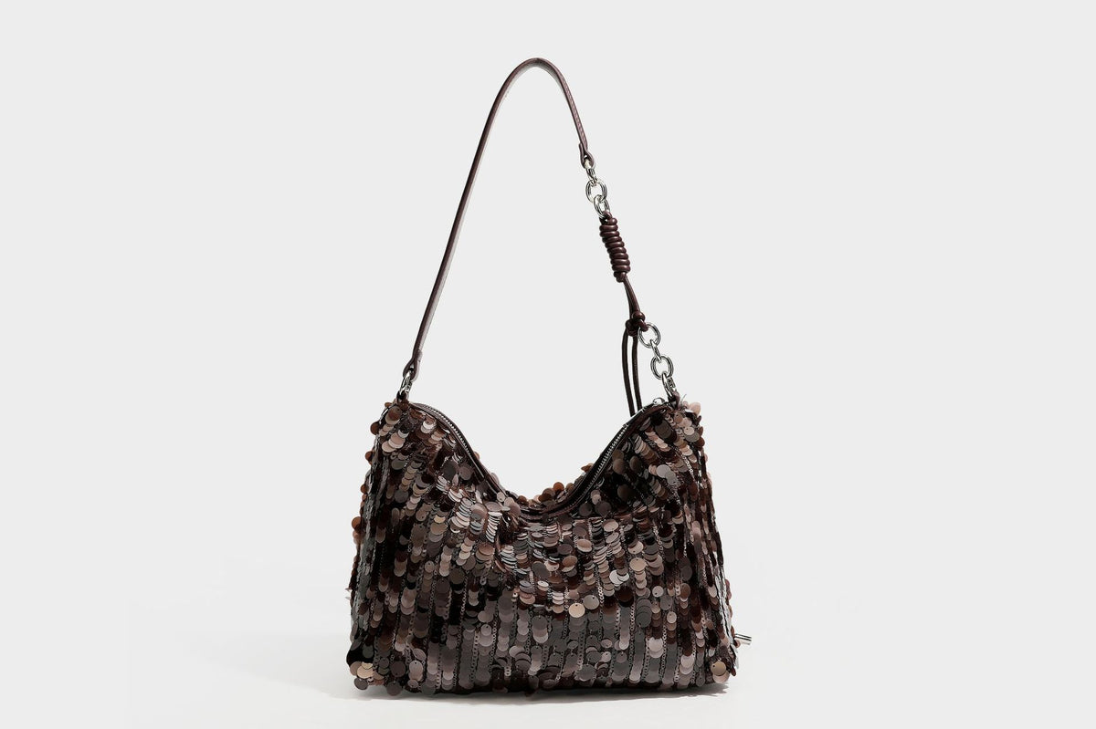 Slouchy paillette sequin hobo shoulder bag with zip closure and adjustable leather-look strap with silver chain hardware