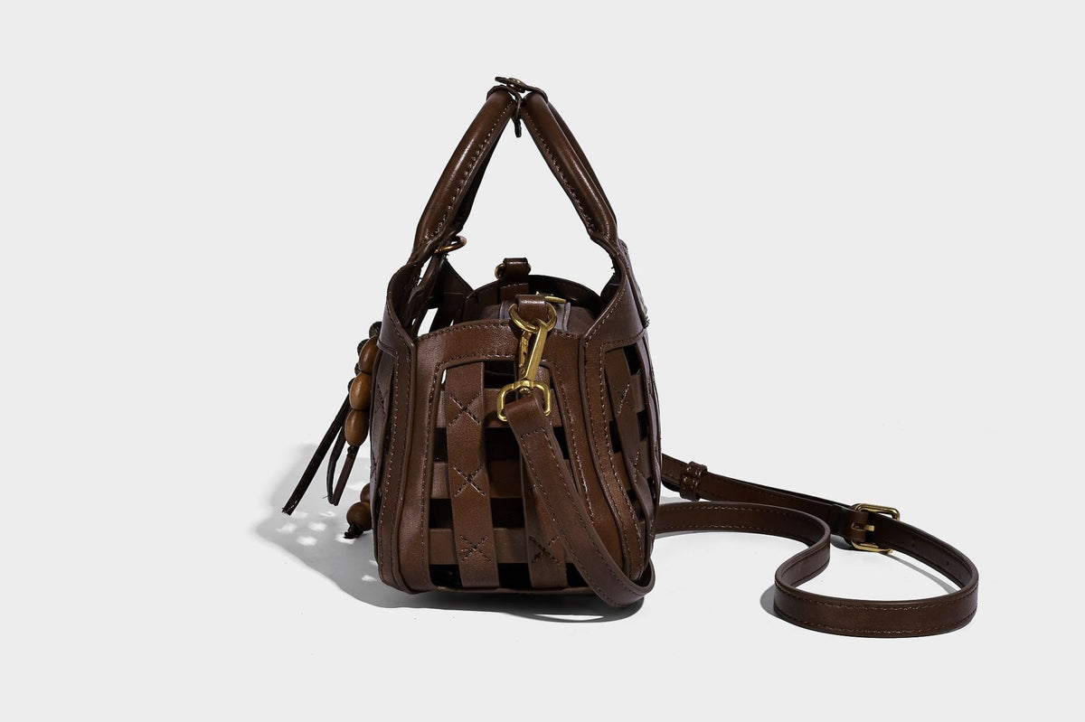 Small structured woven lattice top-handle satchel bag with bead-and-tassel charm and gold-tone hardware, detail view 18