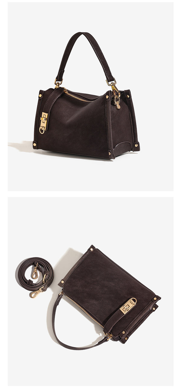 Small structured square handbag in deep dark brown matte pebbled finish with gold-tone turn-lock clasp, top zipper, corner