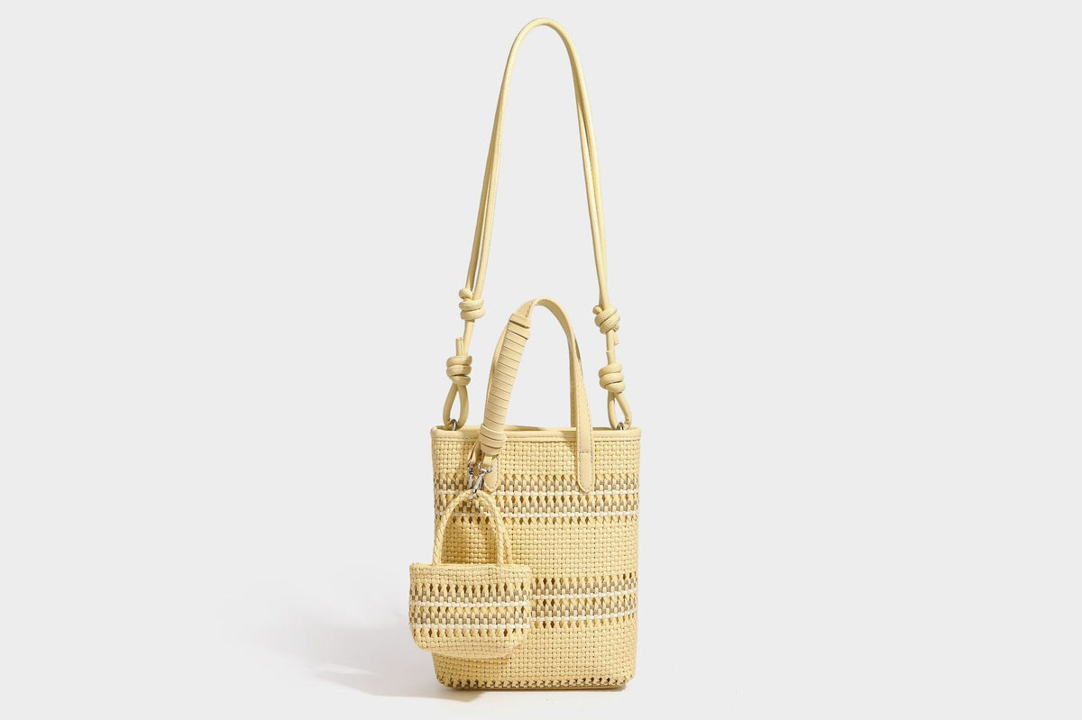 Kleine, formstabile Korb-Shopper-Tasche aus geflochtenem Material mit umwickelten Griffen in Lederoptik und silberfarbenen Verschlussbeschlägen, Detailansicht 42