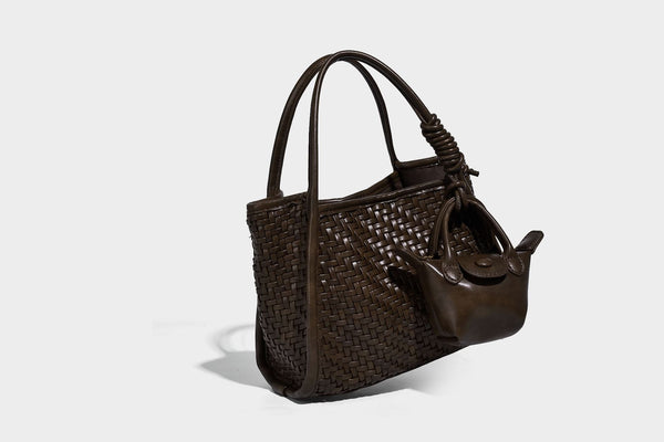Woven texture open-top tote bag with smooth trim top handles and attached mini drawstring pouch in dark brown, detail view 17
