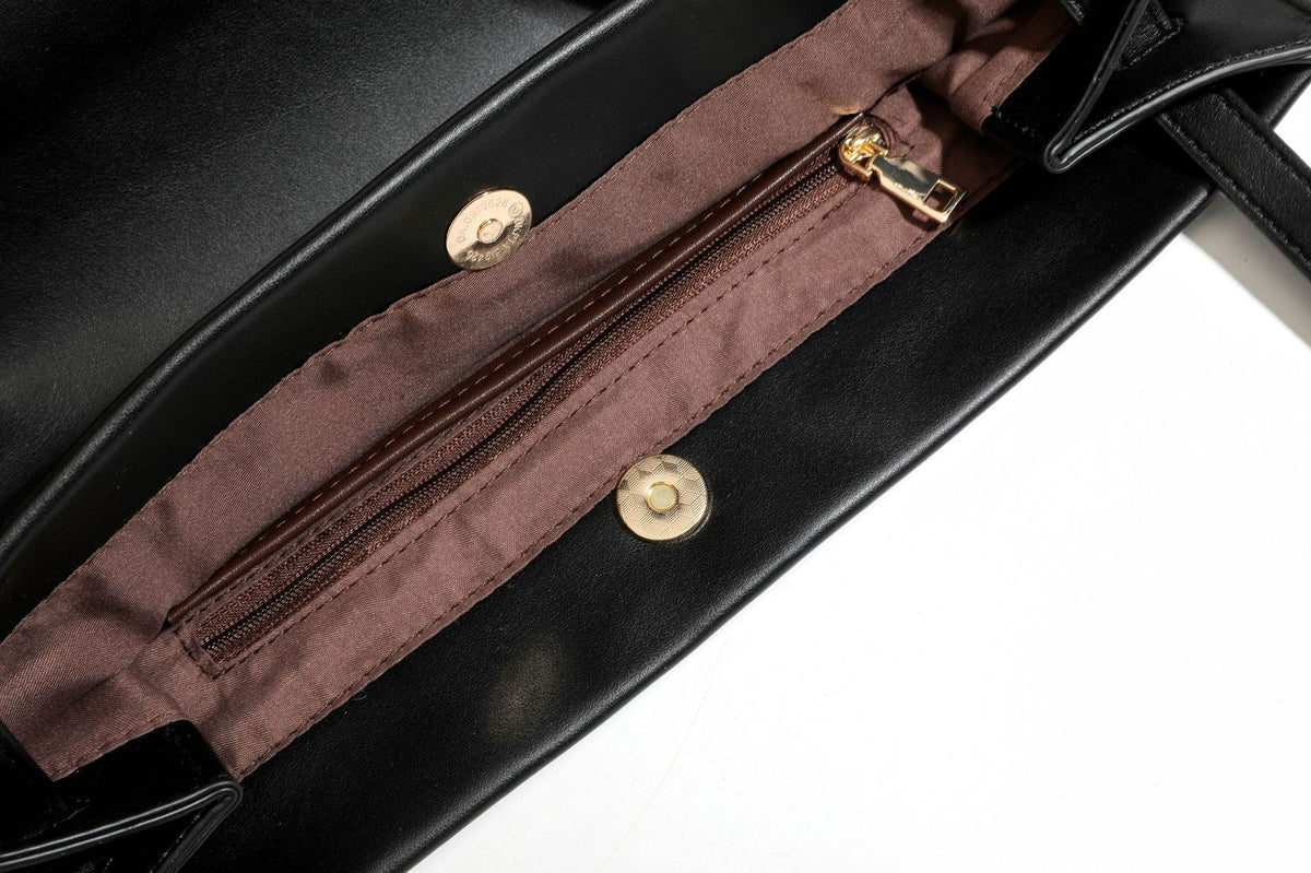 Structured rectangular shoulder tote bag with smooth leather-look finish, long double straps, and gold-tone gourd emblem on