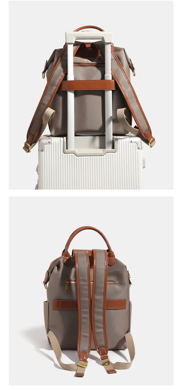 Soft rectangular nylon convertible backpack handbag with leather-look trim, snap-flap closure, top carry handles, padded