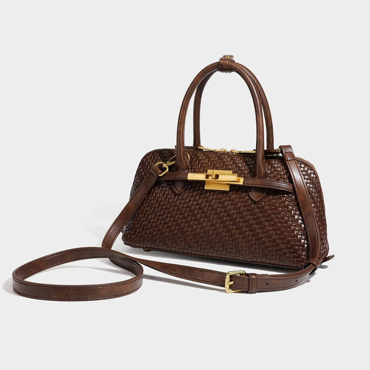 Structured woven-embossed leather-look satchel with dual rolled top handles, gold-tone turn-lock closure, and detachable
