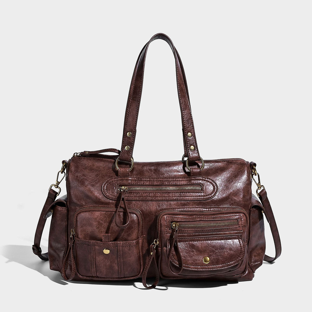 Distressed leather-look vintage satchel shoulder bag with multiple front zip pockets, dual top handles, and brass-tone