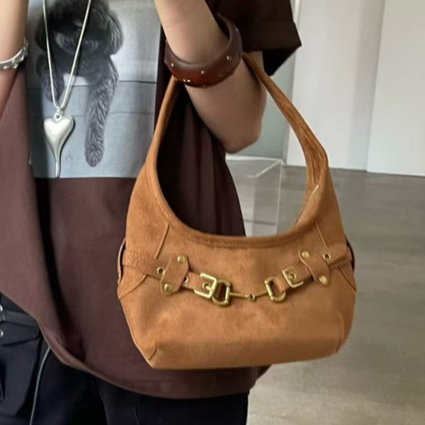 Matte suede-finish half-moon shoulder bag with gold horsebit bar hardware and dome studs, front view