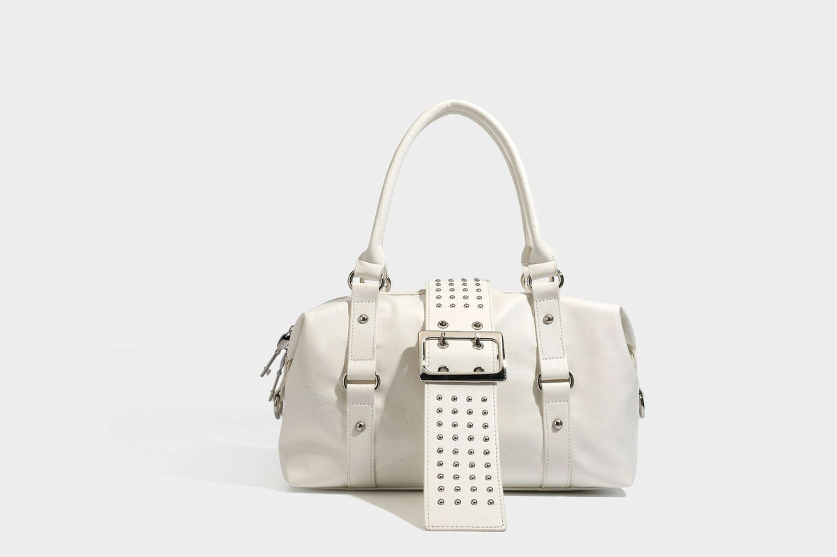 Glossy crinkled barrel handbag with silver stud buckle strap and detachable shoulder strap, detail view 20