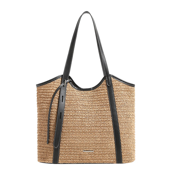 Camelbraune, gewebte Tragetasche in Raffia-Optik mit schwarzer Besatzkante in Lederoptik, langen Schulterriemen und magnetischem Druckverschluss, Detailansicht 5