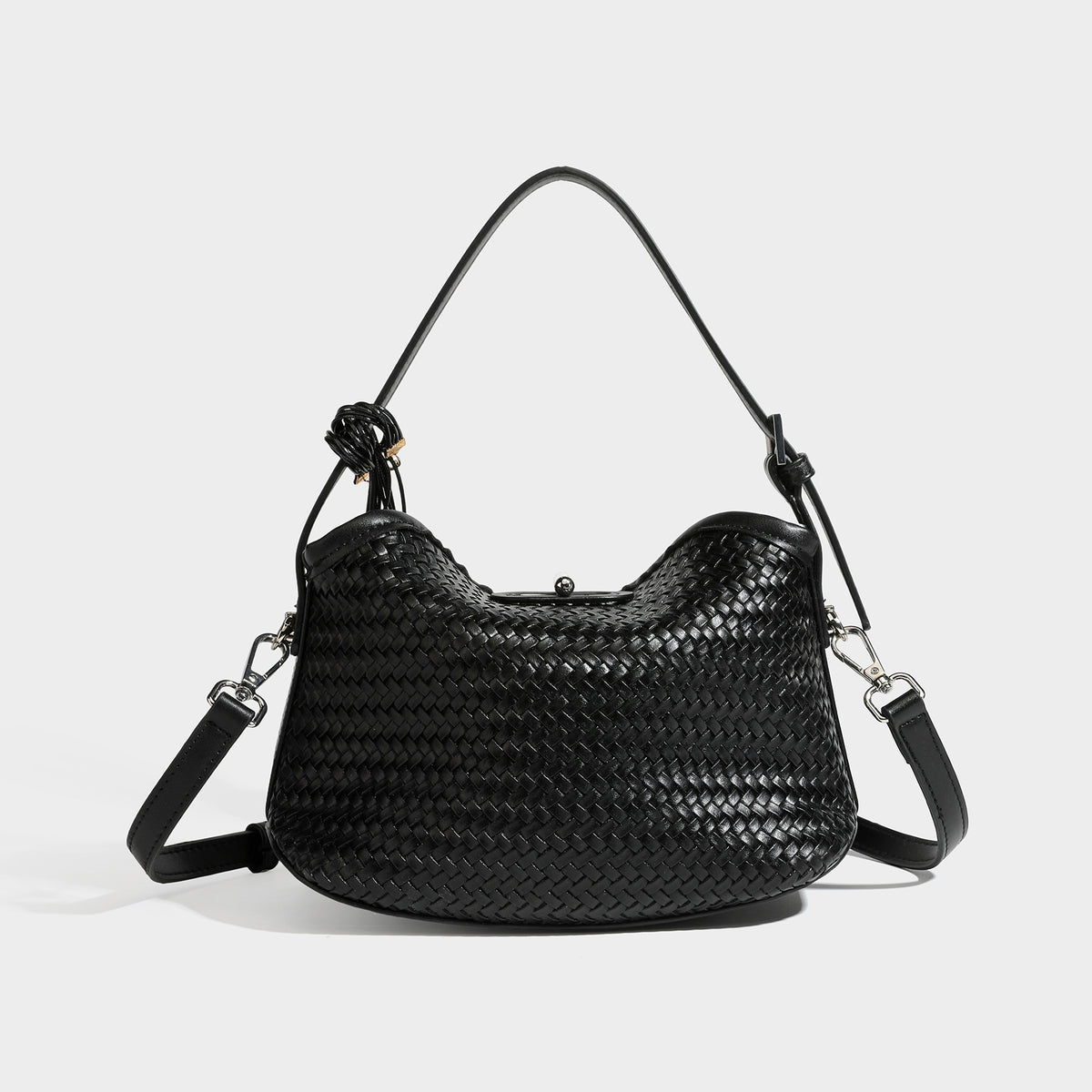 Small woven-look leather-look flap shoulder hobo bag in burgundy with silver-tone hardware and decorative tassel charm