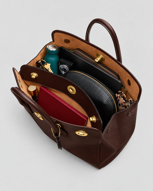 Structured leather-look tote bag with three gold-tone turn-lock closures and double rolled top handles, detail view 16
