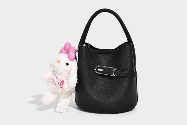 Mini pebbled leather-look bucket bag with front buckle strap, silver-tone hardware, top handle, and detachable shoulder