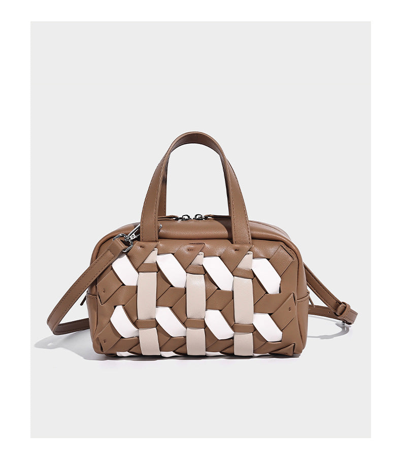 Small structured satchel bag with two-tone woven front panel, dual top handles, and detachable crossbody strap in tan brown