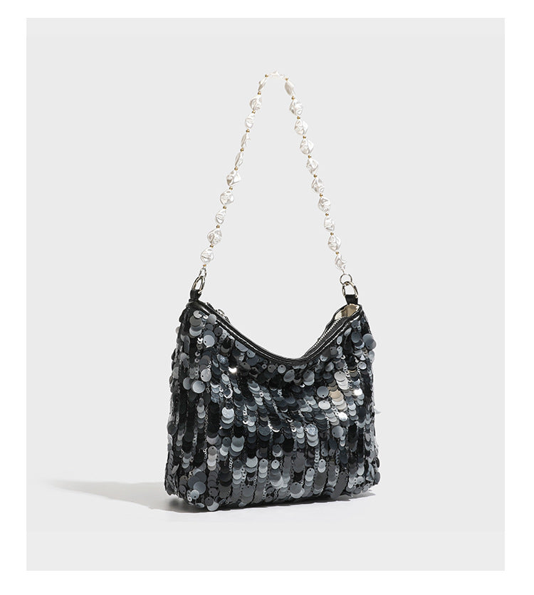 Small crescent sequin shoulder bag with pearl beaded strap and zip closure, detail view 18