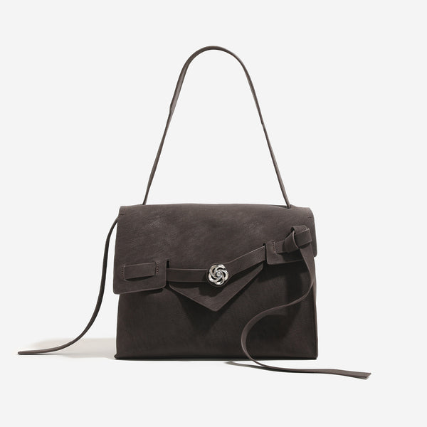 Strukturierte, rechteckige Satchel-Tasche mit Klappe, floralem Metall-Drehverschluss und verstellbarem Crossbody-Riemen aus mattem, strukturiertem