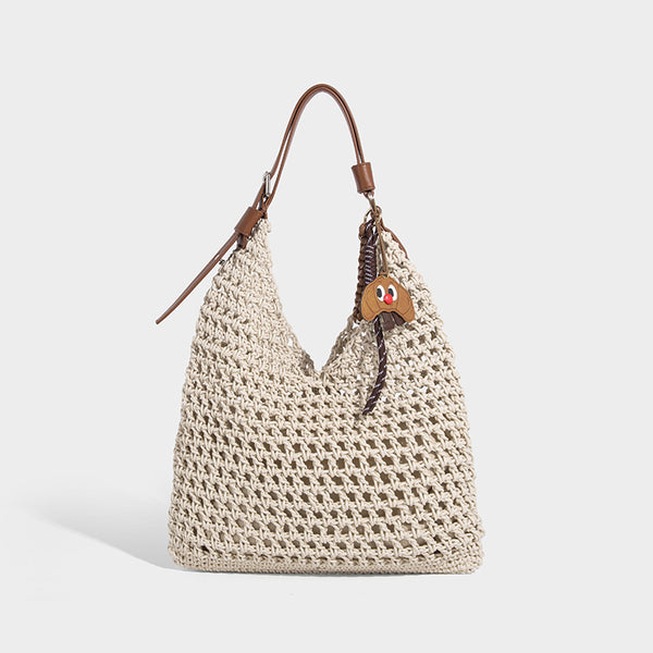 Slouchy open-knit crochet hobo tote bag with leather-look top handle and metal buckle hardware, detail view 6