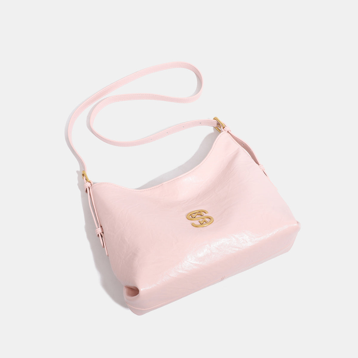 Slouchy hobo shoulder bag in crinkled gloss leather-look with gold-tone hardware and adjustable strap, detail view 4