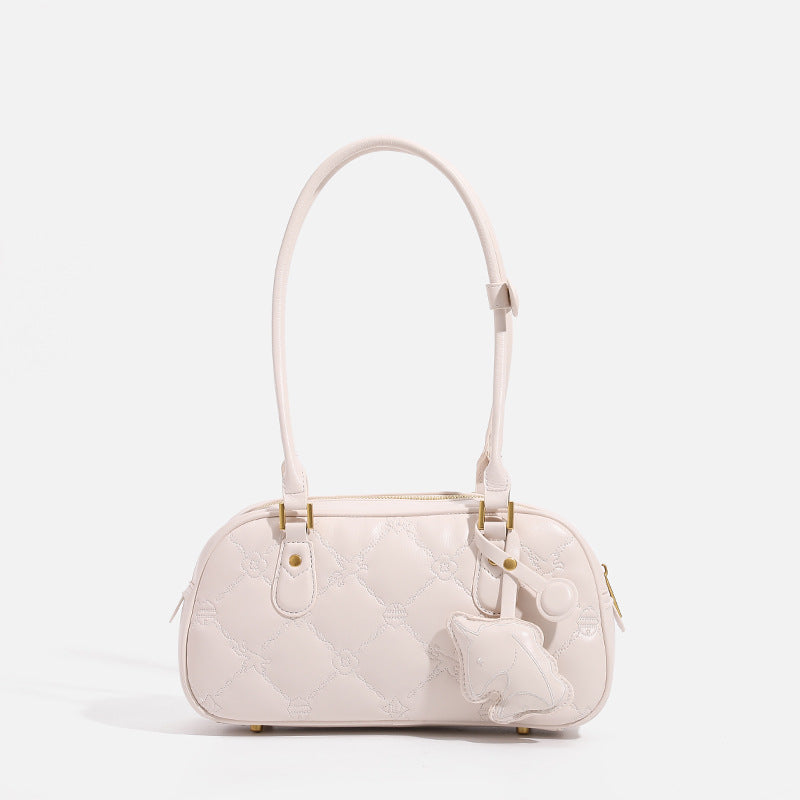 Small structured quilted leather-look zip shoulder bag with gold-tone hardware and adjustable strap, detail view 6