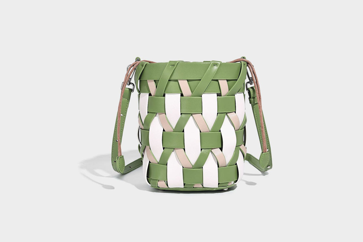 Small woven lattice bucket bag in tan and cream leather-look strips with drawstring top and detachable crossbody strap