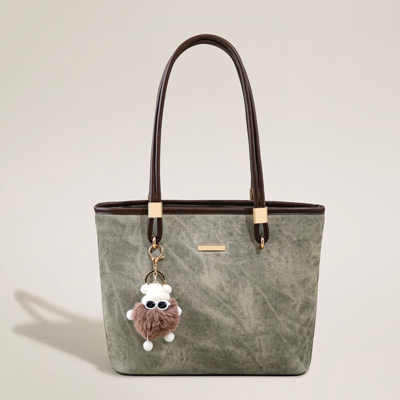 Große, strukturierte Vintage-Tote-Tasche in Salbeigrün mit kaffeebraunem Lederimitatbesatz, goldfarbenen Beschlägen und abnehmbarem Plüsch
