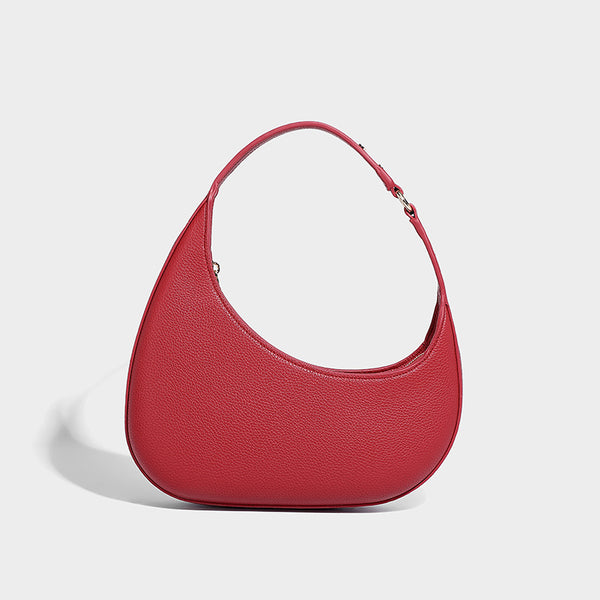 Halbmondförmige Hobo-Schultertasche in genarbter Lederoptik mit schmalem Riemen und goldfarbenen Reißverschlussdetails, Detailansicht