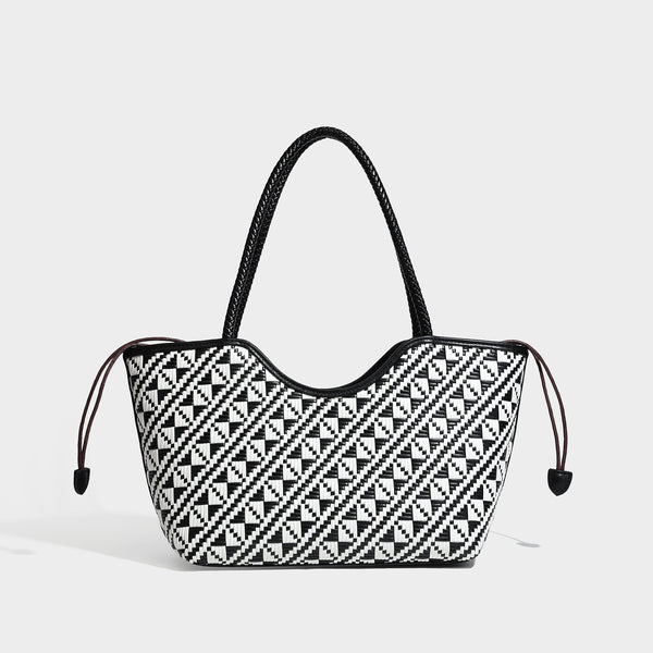 Woven geometric two-tone tote bag with braided shoulder straps and leather-look trim, detail view 6
