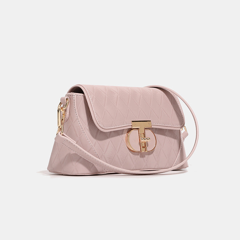 Small structured diamond-quilted flap bag with gold-tone turn-lock closure, chain shoulder strap, and cylindrical top handle