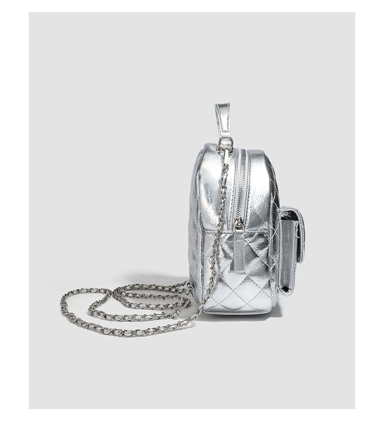 Quilted leather-look backpack purse with chain strap and turn-lock front pocket, detail view 14