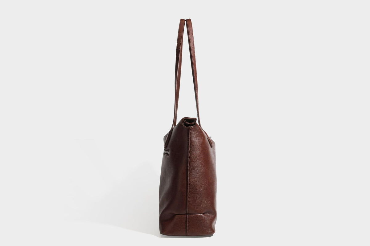 Large leather-look tote shoulder bag with slim double straps and silver-tone turn-lock closure, detail view 29