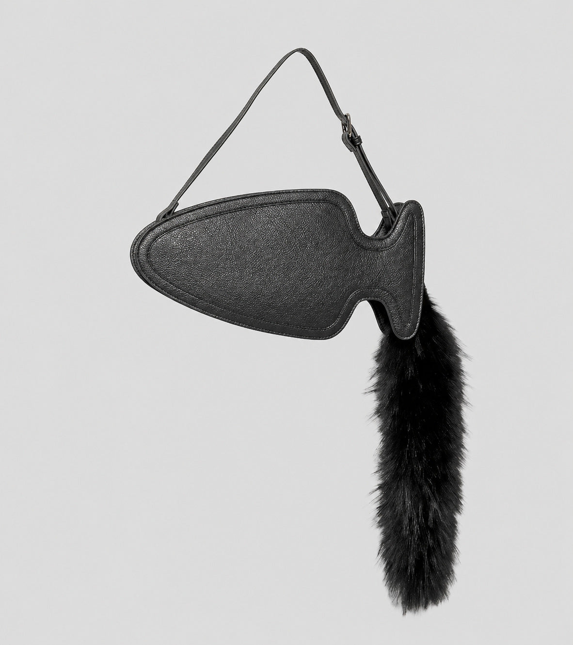Fish-shaped pebbled leather-look crossbody bag with black faux-fur tail accent and adjustable shoulder strap, detail view 6