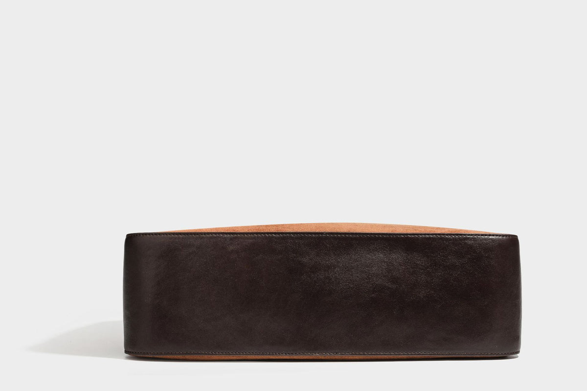 Slouchy cognac brown matte suede-look hobo shoulder bag with dark brown leather-look trim, top zip closure, front flap