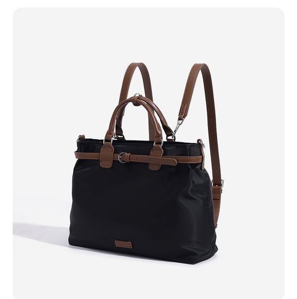 Strukturierte wandelbare Tote-Bag aus mattem Nylon mit Besatz in brauner Lederoptik, Schnallendetail und Metallbeschlägen in Silberoptik