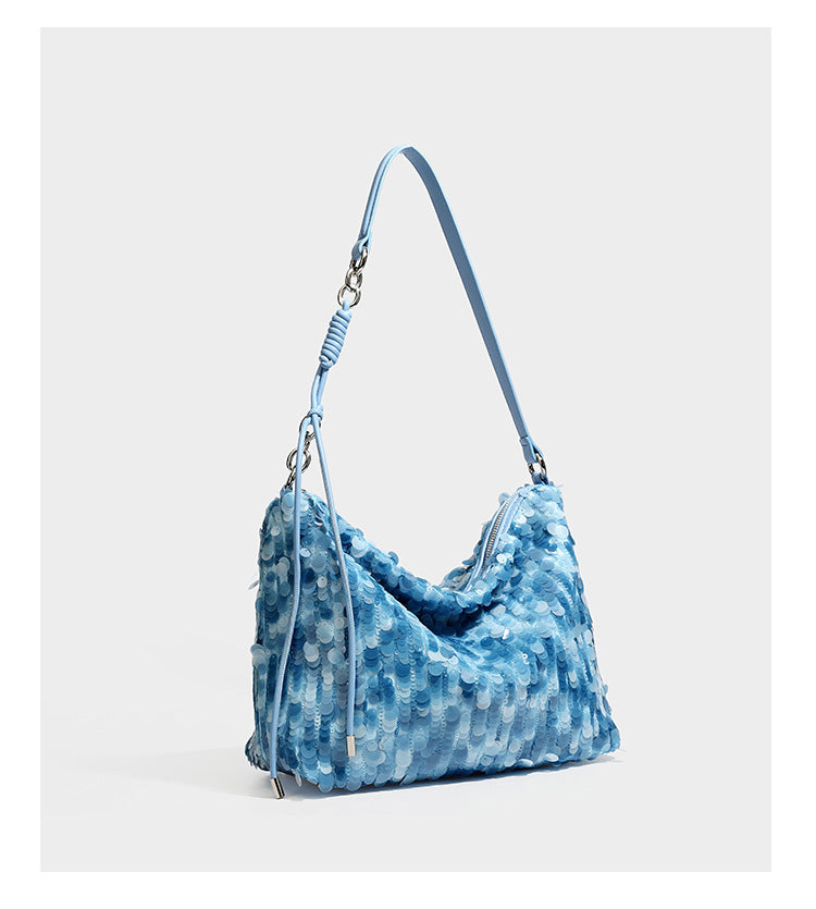 Slouchy paillette sequin hobo shoulder bag with zip closure and adjustable leather-look strap with silver chain hardware