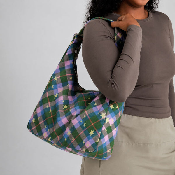 Multicolor plaid and star print hobo shoulder bag with knotted strap and silver-tone zip closure, detail view 12