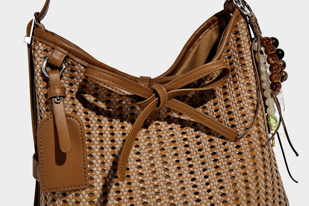 Slouchy open-weave shoulder tote bag with leather-look tan trim, tie-front closure, and long adjustable strap, detail view 16