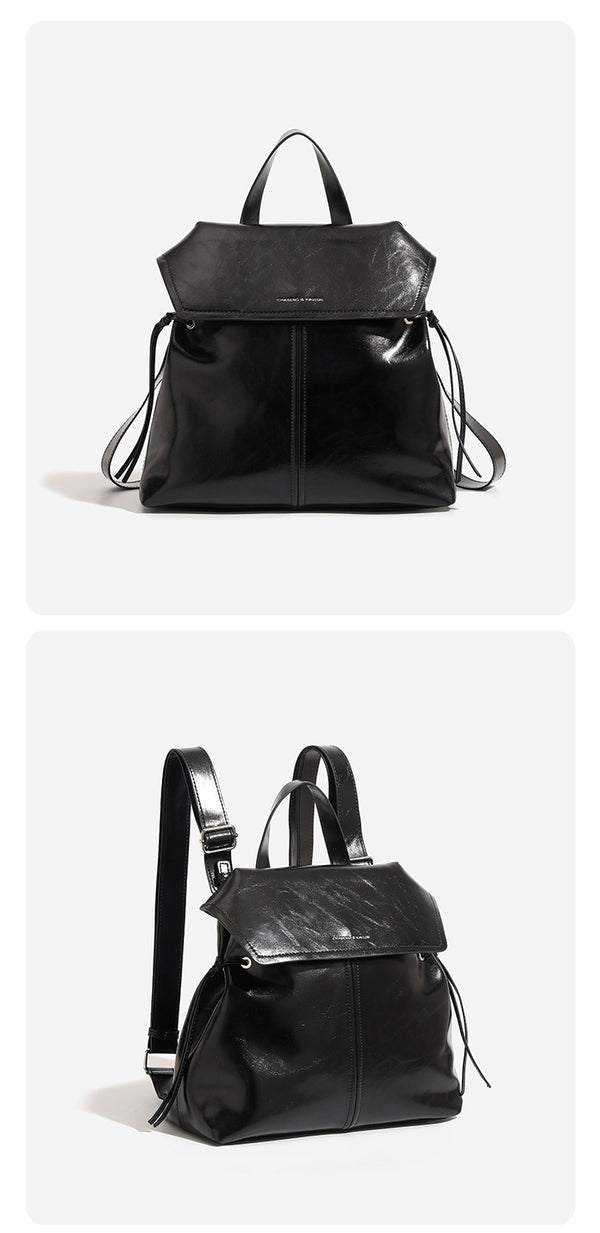 Strukturierte Rucksacktasche mit Überschlag in Used-Lederoptik, seitlichen Kordelzügen und silberfarbenen Metalldetails, Detailansicht