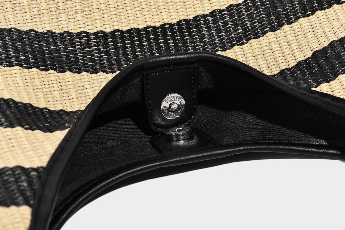 Black and beige striped woven shoulder tote bag with leather-look trim and detachable black zip pouch, detail view 18