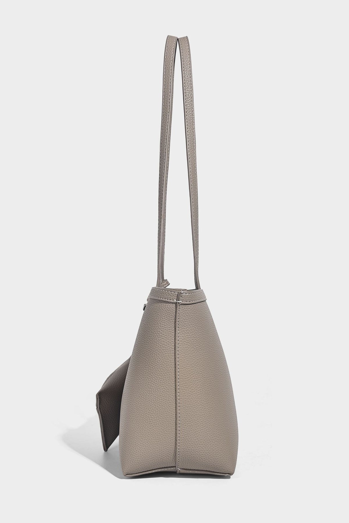 Structured pebbled leather-look tote bag in taupe with long shoulder strap, detachable zip pouch, and pink tulip flower