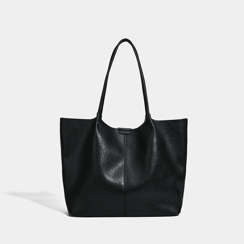 Large open-top leather-look tote bag with single shoulder strap and crinkle texture, detail view 7