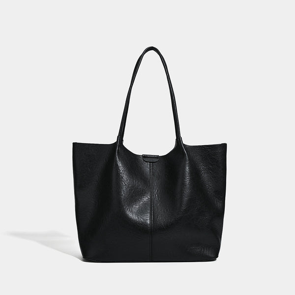 Large open-top leather-look tote bag with single shoulder strap and crinkle texture, detail view 7