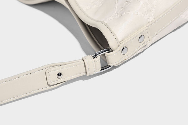 Diamond-quilted leather-look bucket shoulder bag with knotted strap accent and attached mini pouch, detail view 27