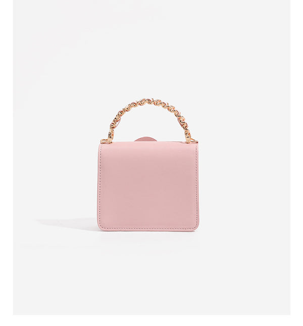 Small structured rectangular crossbody bag with layered 3D flower appliqué and gold-tone chain strap, detail view 18