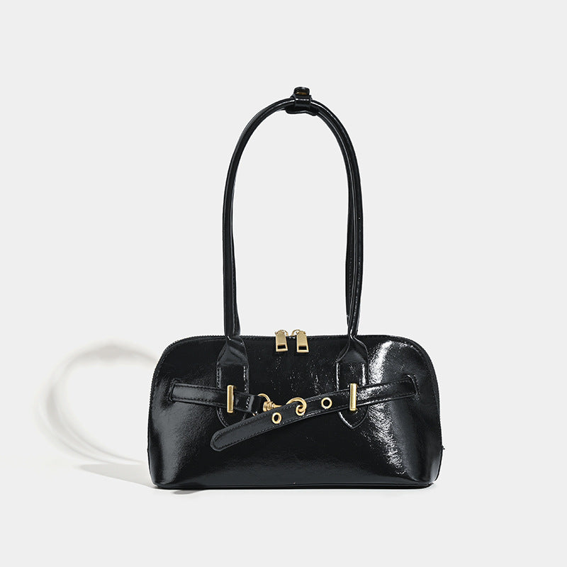 Small structured glossy leather-look shoulder bag with gold-tone buckle hardware and twin top handles, detail view 7