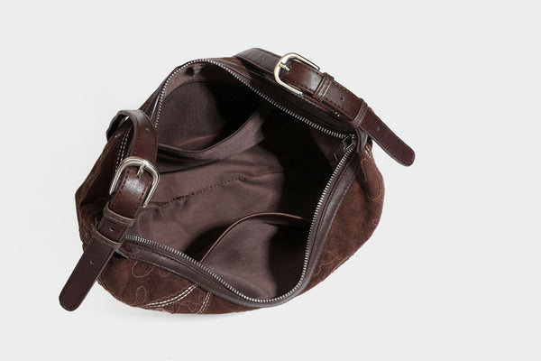 Deep chocolate suede-look hobo shoulder bag with tonal paisley floral embroidery, smooth dark leather-look trim, top zip