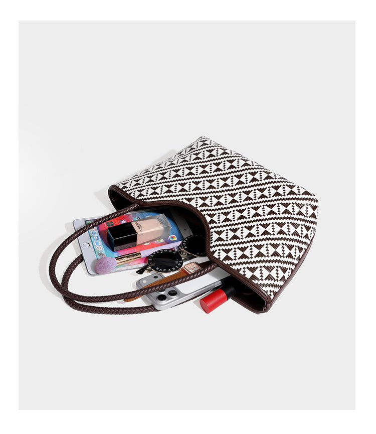 Woven geometric two-tone tote bag with braided shoulder straps and leather-look trim, detail view 18