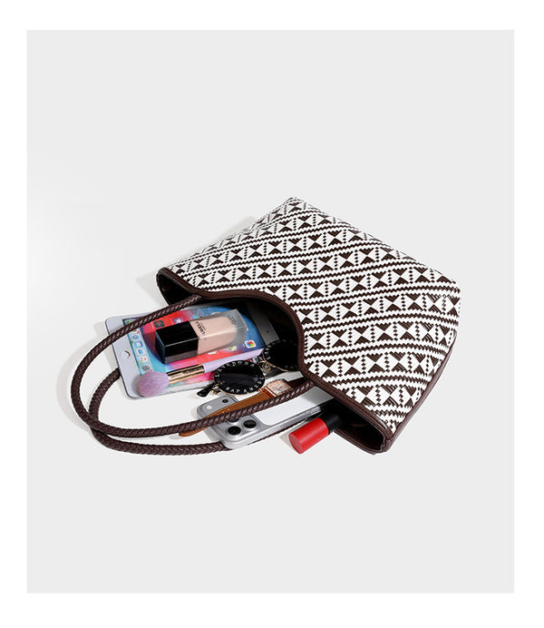 Woven geometric two-tone tote bag with braided shoulder straps and leather-look trim, detail view 18